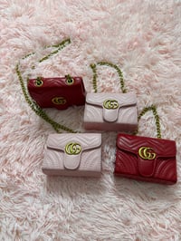 Image 1 of Mini Gucci