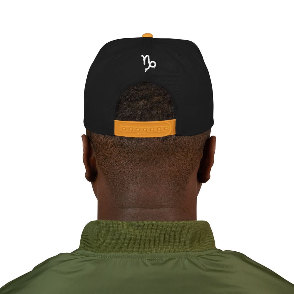 Image of Unisex Zodiac Capricorn Embroidered Snapback Hat — Stylized Capricorn Symbol & Text