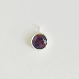 Image of Pinkish Sapphire round star cut silver necklace