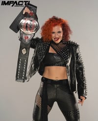 IMPACT Tag Champ 8x10