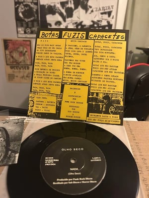 Olho Seco – Botas Fuzis Capacetes 7"