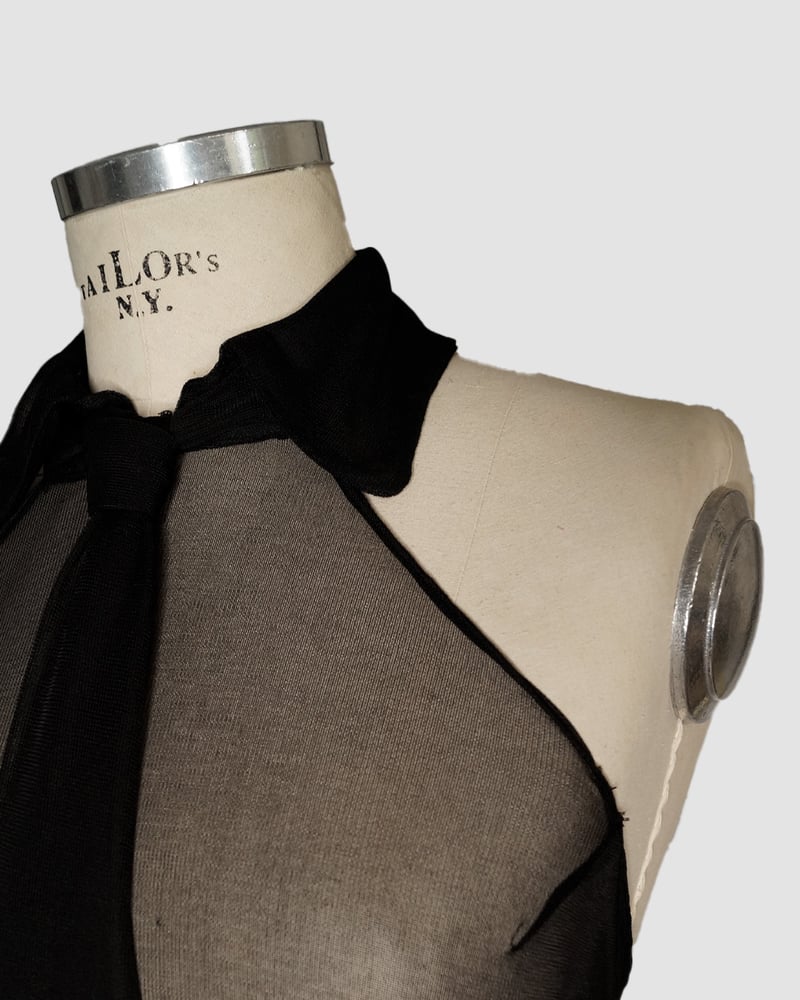 Image of ‘LUDIC‘ tie top and ‘SKELETON‘ skirt 