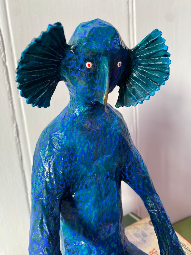 Image of Seated Sea Monster