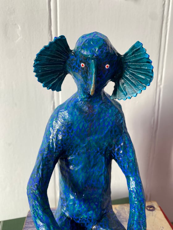 Image of Seated Sea Monster