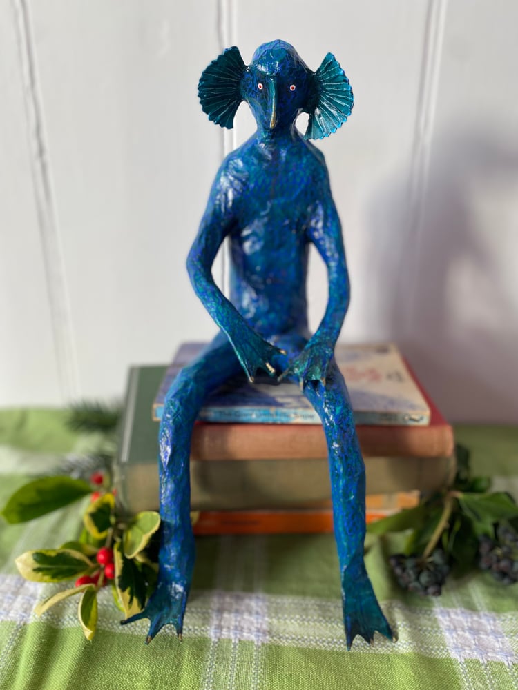 Image of Seated Sea Monster