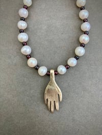 Image 4 of Lover’s Hand pendant with garnet and pearl
