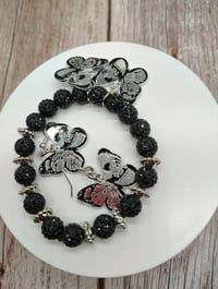 Image 5 of Enchanted Skull & Butterfly Bracelet and Earring Duo