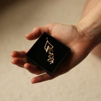 Image 2 of Advent day 13- two part intestinal wiggler in bronze