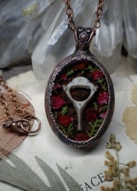 Image 1 of Piglet Vertebra and Floral Pendant