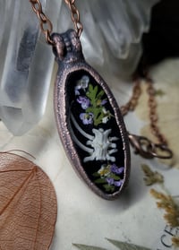 Image 1 of Snake Bones and Floral Pendant
