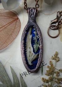 Image 3 of Dragon Jawbone and Floral Pendant