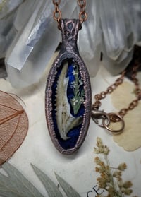Image 5 of Dragon Jawbone and Floral Pendant