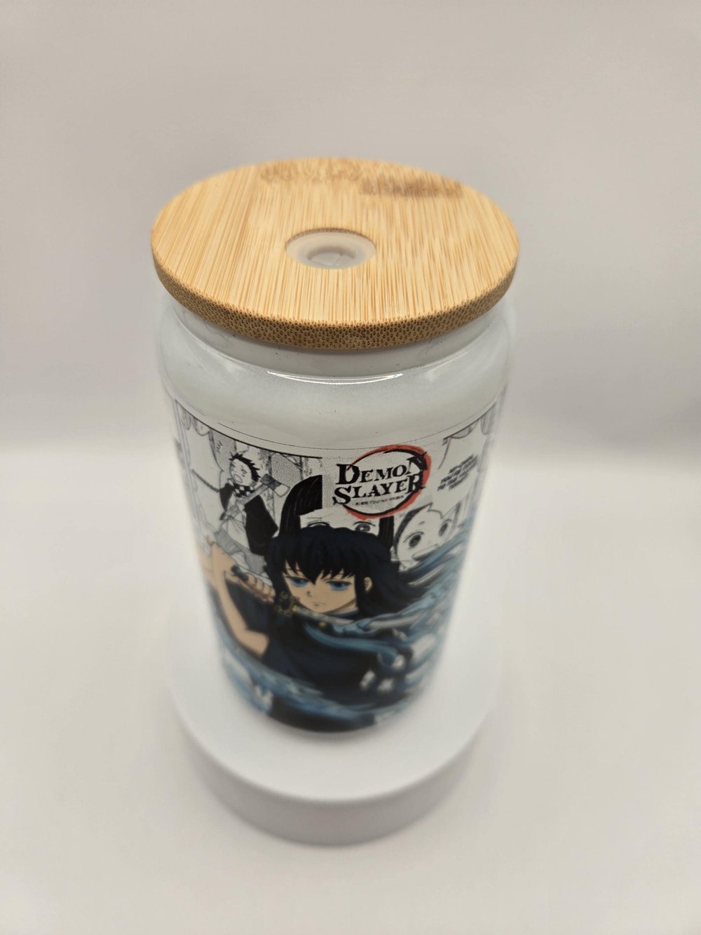 Image of Anime-Inspired Frosted Glass Cup – Comic Panel Wrap + Blue Warrior Art | Bamboo Lid + Metal Straw