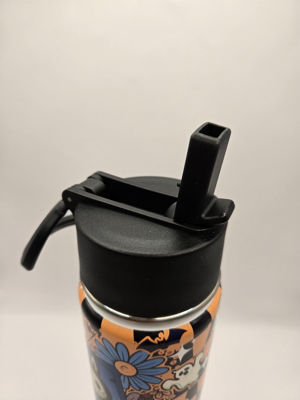 Image of Spooky Storybook Menace | Horror-Inspired Cartoon Art Water Bottle