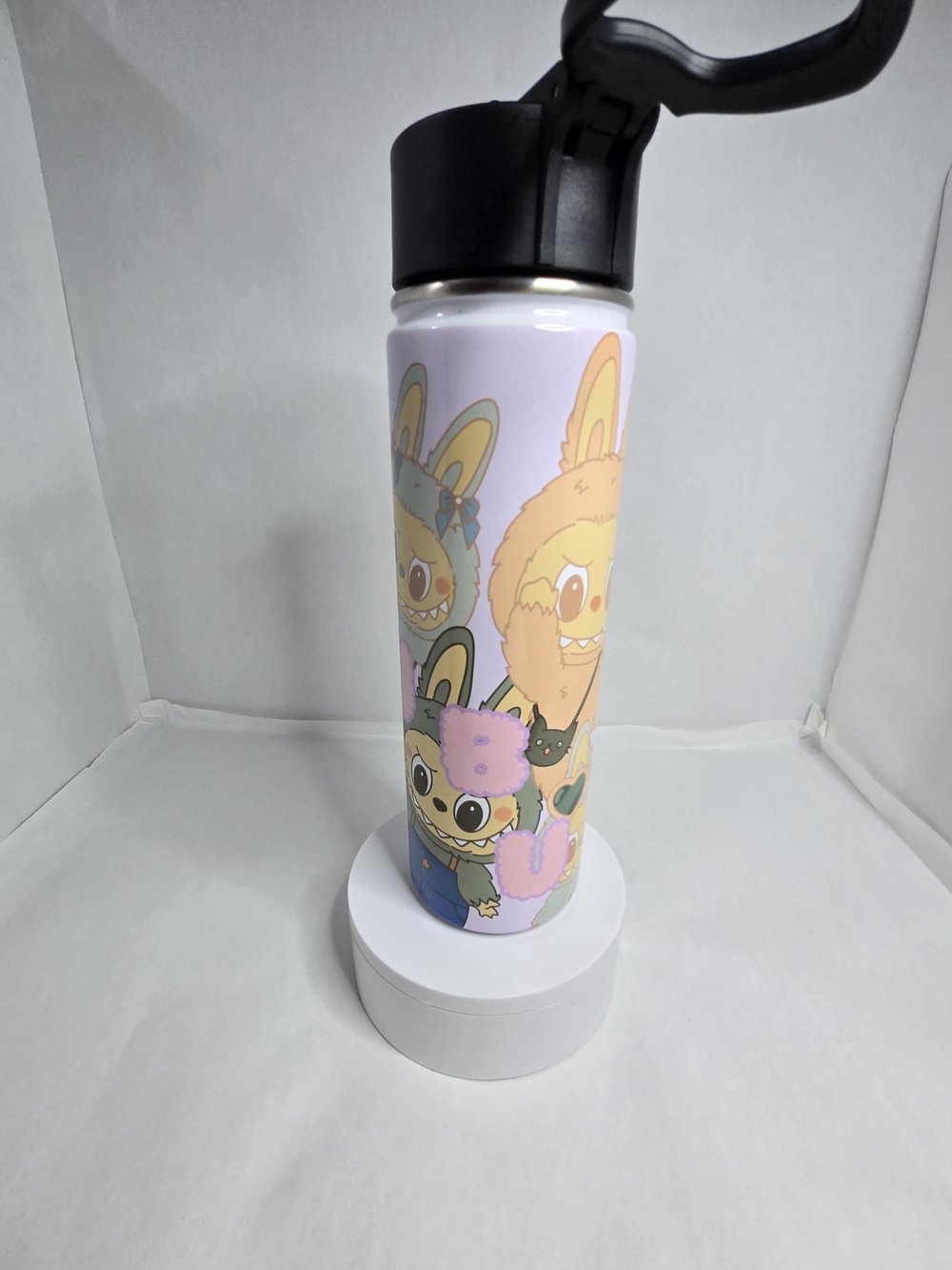 Image of Quench Your Thirst with a Dash of Lalubu Love - 22oz Tumbler - Your Hydration Hero!