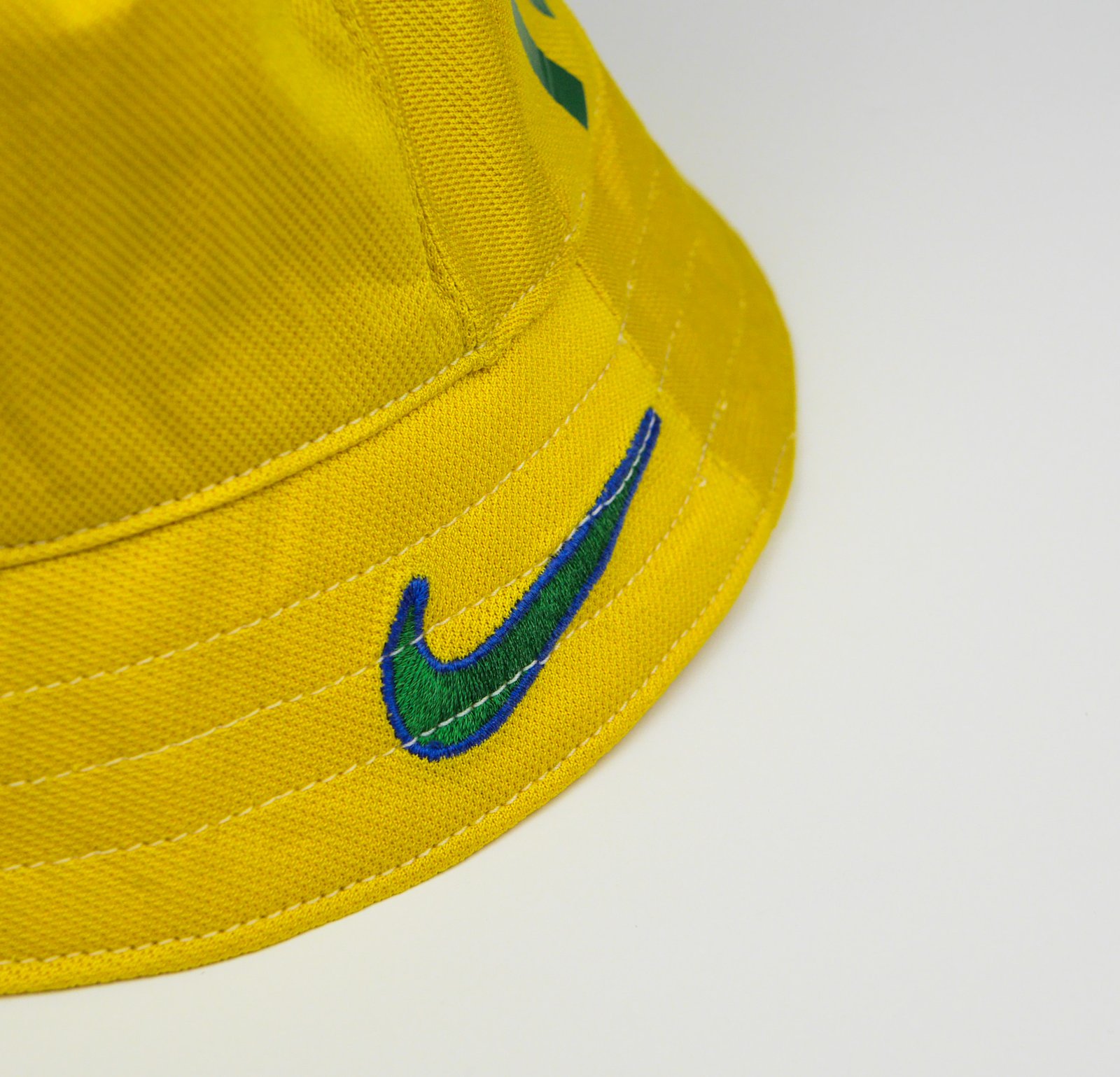 yellow nike bucket hat