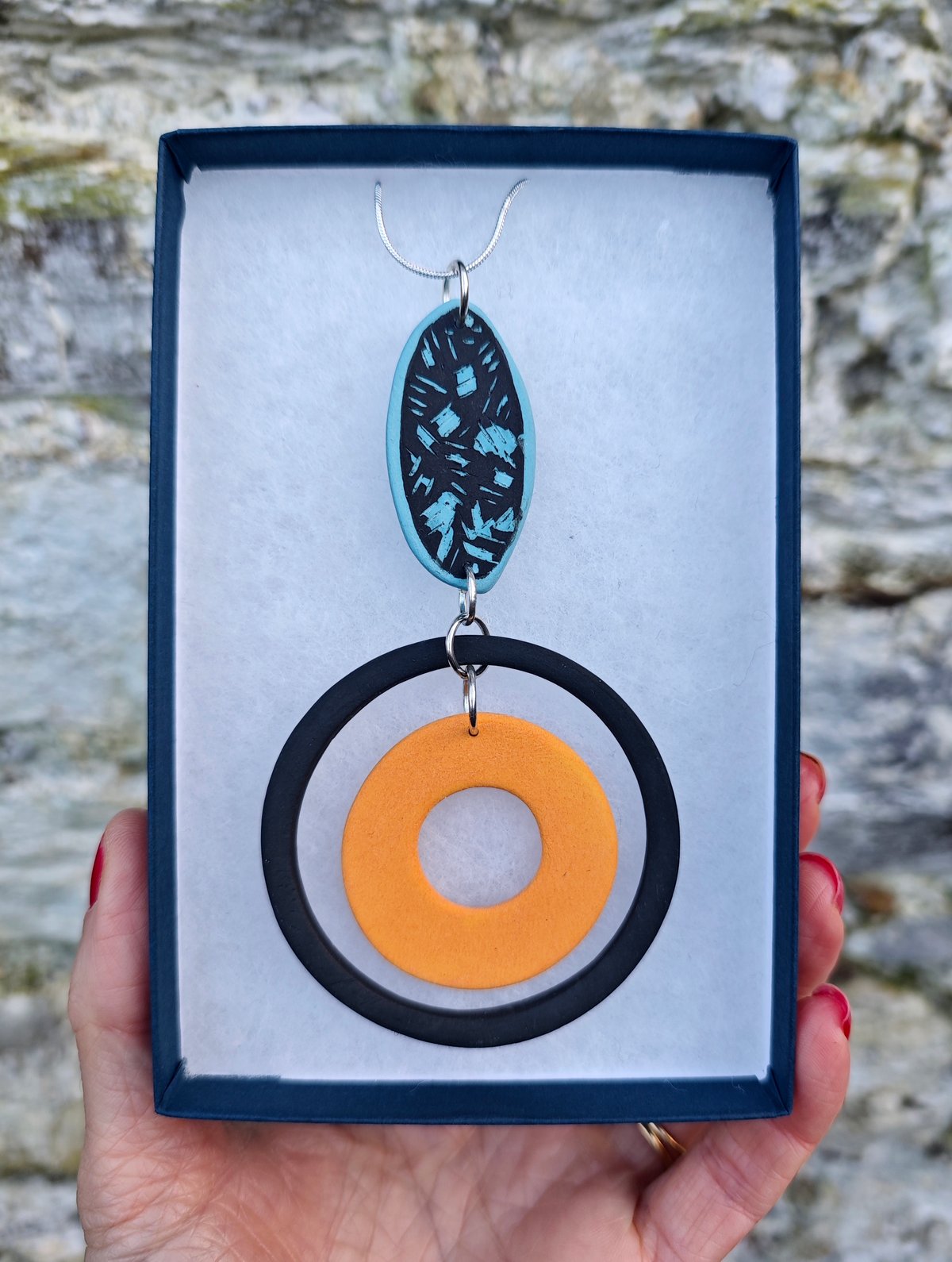 Image of Black/Ochre/ Blue Shellseeker Pendant