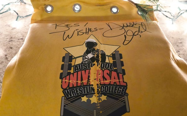 Image of Signed  Austin Idol's Universal Wrestling College Turnbuckle