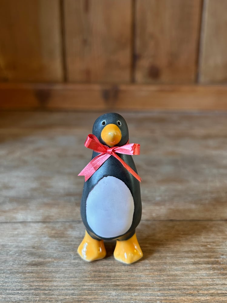 Image of ceramic penguin sculptures