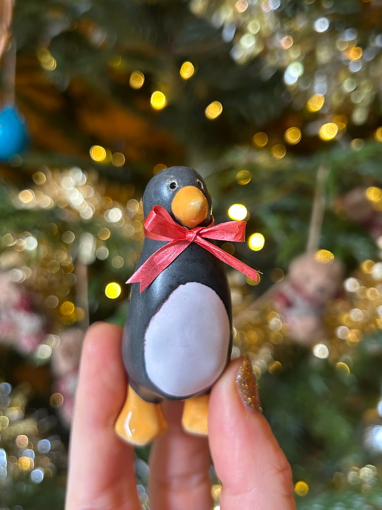 Image of ceramic penguin sculptures