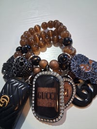 Image 2 of Gucc with in black and brown with bow