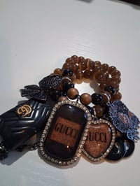Image 1 of Gucc with in black and brown with bow