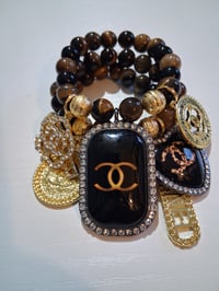 Image 1 of Gold and brown cc with bow