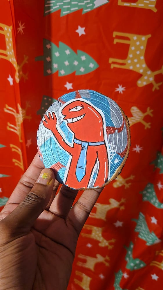 Image of Allan on a Wooden Slice 