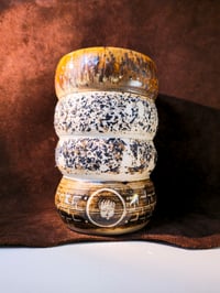 Image 1 of Trimmings on a Cup - Red Gold