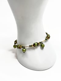 Image 2 of 1PC. OLIVE/METALLIC GREEN FIRE POLISHED GLASS BEADED MEMORY WIRE BRACELET
