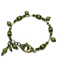 Image 3 of 1PC. OLIVE/METALLIC GREEN FIRE POLISHED GLASS BEADED MEMORY WIRE BRACELET