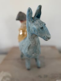 Image 1 of Clay: going to town on my llama