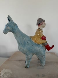 Image 4 of Clay: going to town on my llama