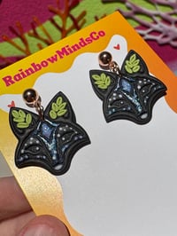 Image 3 of Starlight Fox Polymer Clay Earrings- Black Fox Dangles with Sparkly Blue Shimmer & Leaf Details