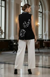 Image 2 of CHALECO FACE