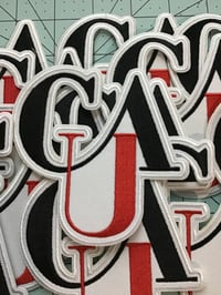 Image 1 of CAU iron on patch 