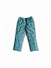 Image 1 of Pantalon turquoise à motif floral