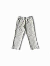 Image 1 of Pantalon blanc à motif embossé 