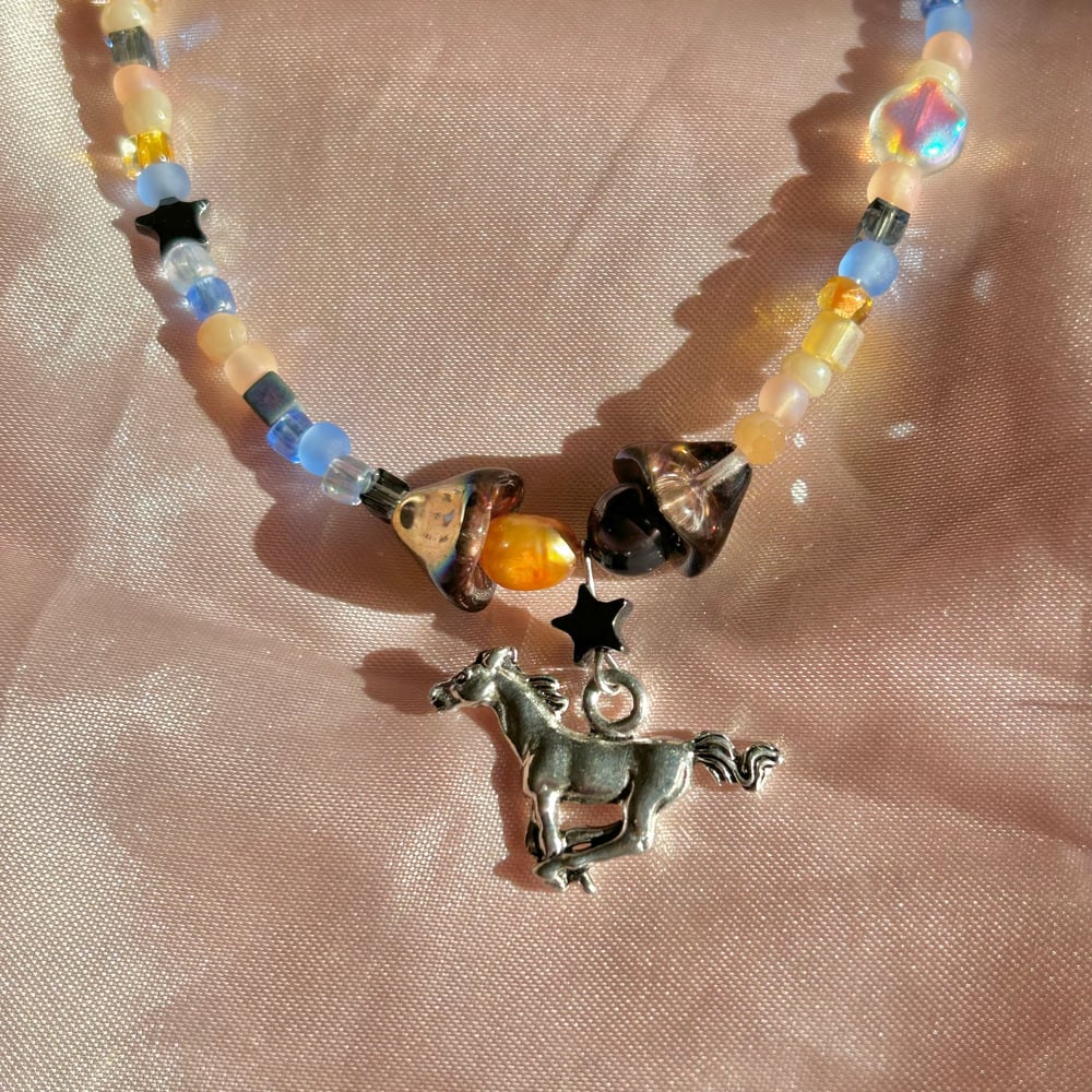 Image of first star galloping horse