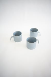 Image 1 of Taza azul clarito