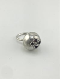 Image 1 of button binkie ring