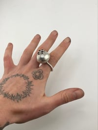 Image 2 of button binkie ring