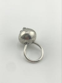 Image 3 of button binkie ring