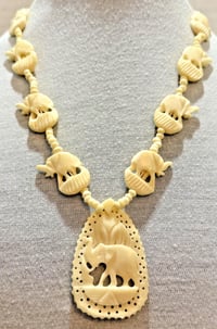 Image 1 of Vintage 1970s Carved Cow Bone Beaded Elephant Necklace