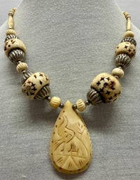 Image 1 of Vintage 1960s Hand Carved Bone Bead &amp; Pendant with Silver Tone Metal Accents