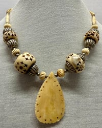 Image 2 of Vintage 1960s Hand Carved Bone Bead &amp; Pendant with Silver Tone Metal Accents