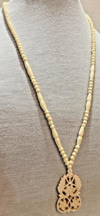 Image 3 of Vintage 1950s Carved Antler Necklace &amp; Floral Pendant