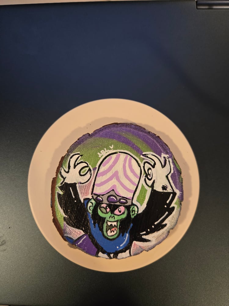 Image of Mojo Jojo on a wooden slice 