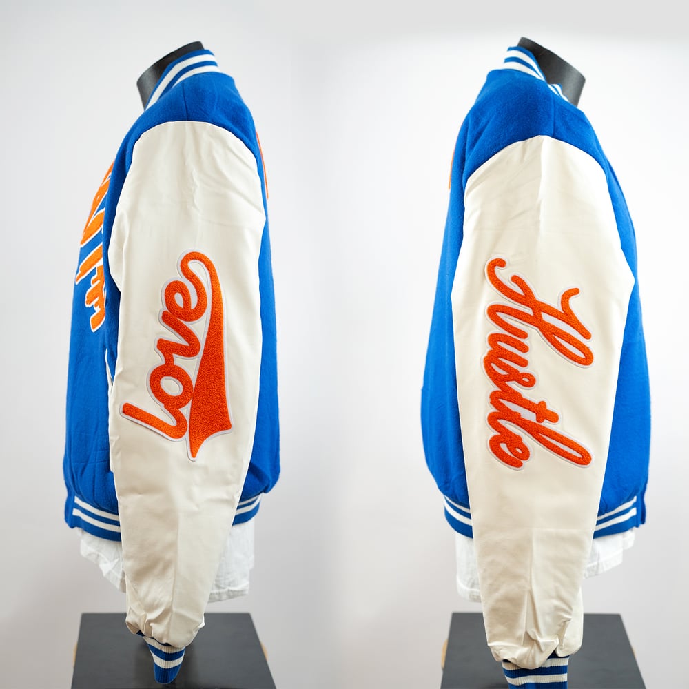 Image of Faith Letterman Blue n' Orange w/ white sleeves