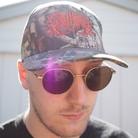 Embroidered logo camo hat